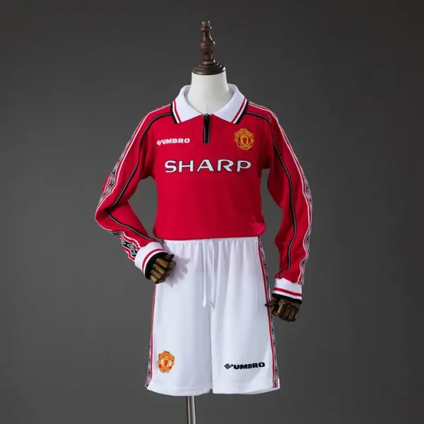 nino-premier-manchester-united-manchester-united-local-1998-99_l0.webp Manchester United Local 1998-99 - Versión Niño