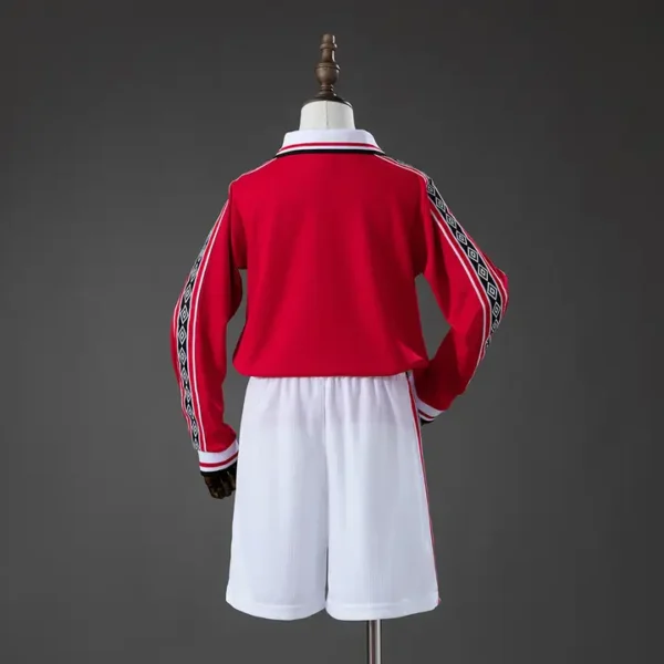 nino-premier-manchester-united-manchester-united-local-1998-99_l1.webp Manchester United Local 1998-99 - Versión Niño