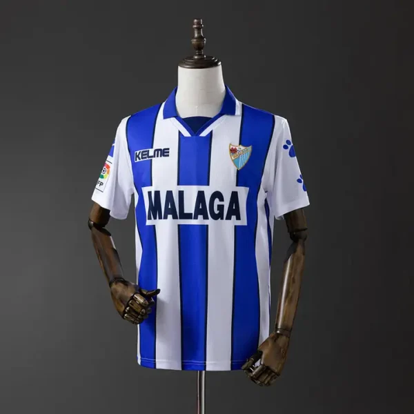retro-laliga-malaga-malaga-local-1998_0.webp Malaga Local 1998 - Versión Retro