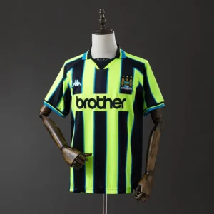 retro-premier-manchester-city-manchester-city-visitante-1998-99_0.webp Manchester City Visitante 1998-99 - Versión Retro