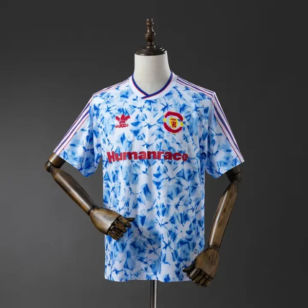 retro-premier-manchester-united-manchester-united-human-race_0.webp Manchester United Human Race - Versión Retro