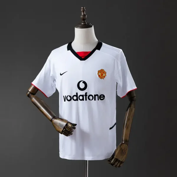 retro-premier-manchester-united-manchester-united-vodafone-visitante-2002-03_0.webp Manchester United Vodafone Visitante 2002-03 - Versión Retro