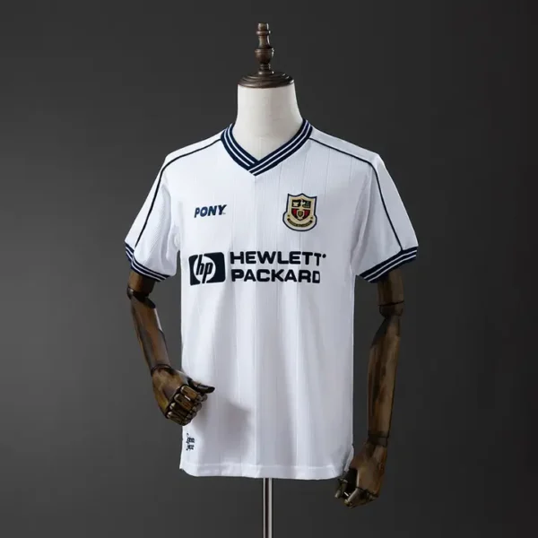 retro-premier-tottenham-hotspur-tottenham-hotspur-local-1997-99_0.webp Tottenham Hotspur Local 1997-99 - Versión Retro