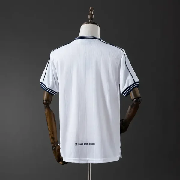 retro-premier-tottenham-hotspur-tottenham-hotspur-local-1997-99_1.webp Tottenham Hotspur Local 1997-99 - Versión Retro