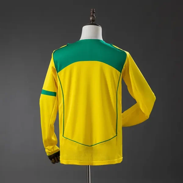 retro-sel-conmebol-brasil-brasil-local-2004_1.webp Brasil Local 2004 - Versión Retro